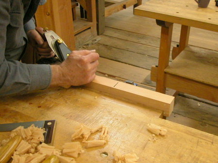 Making sure the plane bottom is flat and true with a flat and true hand plane.